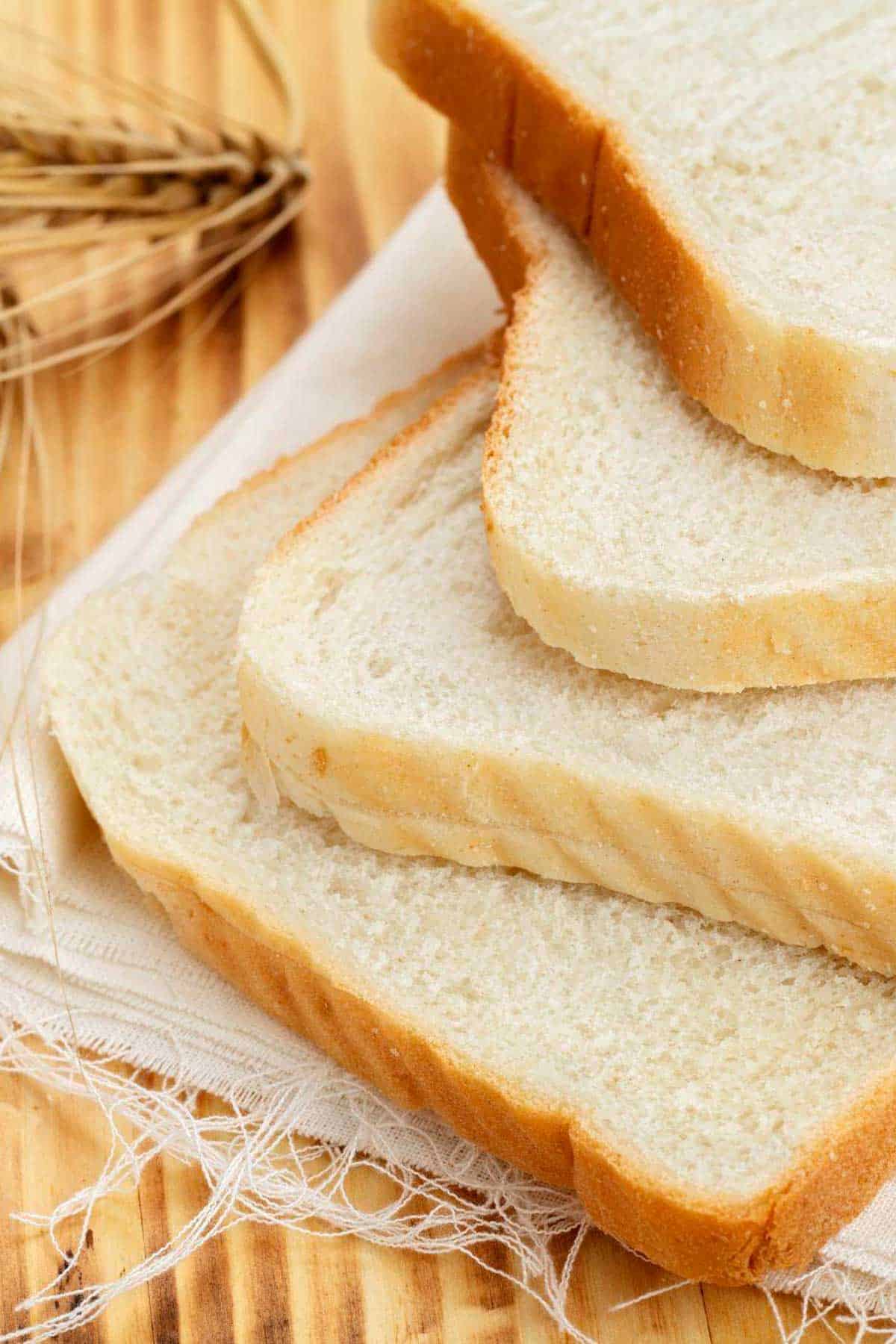 Close up of white bread on a wooden table