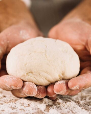 Bread dough in hands