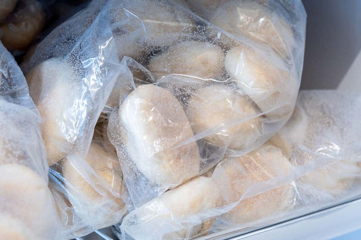 Frozen bread in plastic bags in freezer